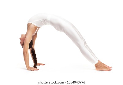 Young Beautiful Woman Yoga Posing On Isolated White Studio Background