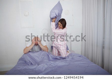 Similar – Little girl holding cookie sitting over the bed