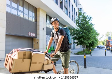 Young Bike Messenger Delivering Parcels