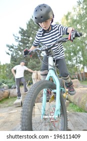 Young Biker Jumping