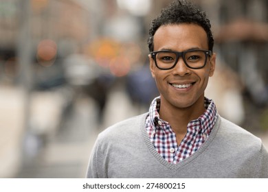 Young Black African Asian Mixed Man In City Smile Happy Face Portrait