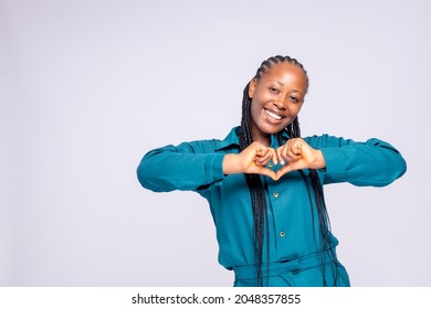 Young Black African Millennial Women Spreading Love . Lady Doing Love Sign 