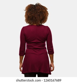 Young Black Afro Woman From Behind, Looking Back