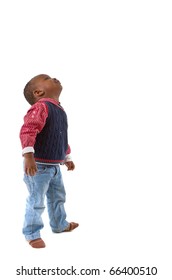 Young black baby boy looking up. Isolated over white background.