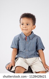 Young Black Boy Looking Happy Stock Photo 1128428621 | Shutterstock