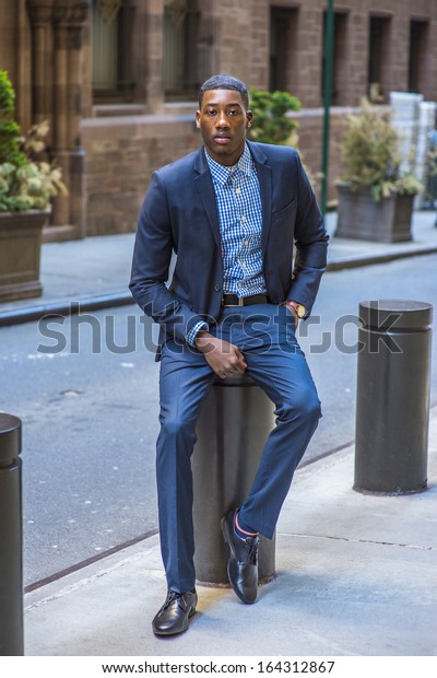 Young Black Businessman Sitting On Street Stock Photo 164312867 