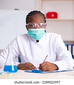 Young Black Chemist Working In The Lab