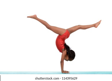 Young black child doing gymnastics front walkover - Shutterstock ID 114395629