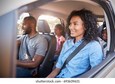 Young Black Family With Children In A Car Going On Road Trip