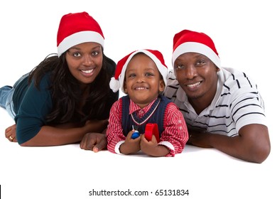 Young Black Family With A Little Boy Are Getting Ready For Christmas. Happy And Cute Image.