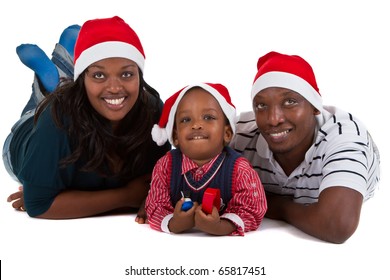 Young Black Family With A Little Boy Are Getting Ready For Christmas. Happy And Cute Image.