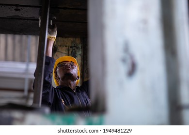 Young Black Male Engineer

Checking Checking And Repair The Machine In Heavy Industry Manufacturing Facility. Service And Maintenance Of Factory Machinery. American African People.