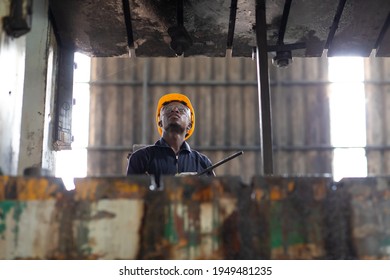 Young Black Male Engineer

Checking Checking And Repair The Machine In Heavy Industry Manufacturing Facility. Service And Maintenance Of Factory Machinery. American African People.