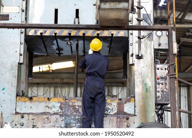 Young Black Male Engineer
Checking Checking And Repair The Machine In Heavy Industry Manufacturing Facility. Service And Maintenance Of Factory Machinery. American African People.