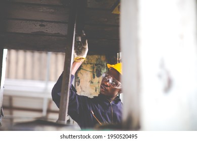 Young Black Male Engineer

Checking Checking And Repair The Machine In Heavy Industry Manufacturing Facility. Service And Maintenance Of Factory Machinery. American African People.