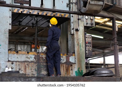 Young Black Male Engineer
Checking Checking And Repair The Machine In Heavy Industry Manufacturing Facility. Service And Maintenance Of Factory Machinery. American African People.