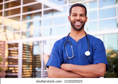 Young black male healthcare worker smiling outside, portrait