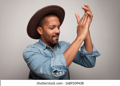 Young Black Man Feeling Happy And Successful, Smiling And Clapping Hands, Saying Congratulations With An Applause.