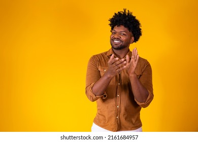 Young Black Man Feeling Happy And Successful, Smiling And Clapping Hands, Saying Congratulations With An Applause.