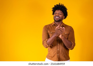 Young Black Man Feeling Happy And Successful, Smiling And Clapping Hands, Saying Congratulations With An Applause.