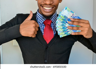 Young Black Man Holding Money (rands) Smiling