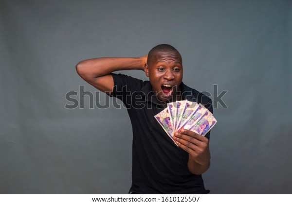 Young Black Man Screaming Holding Some Stock Photo 1610125507 ...