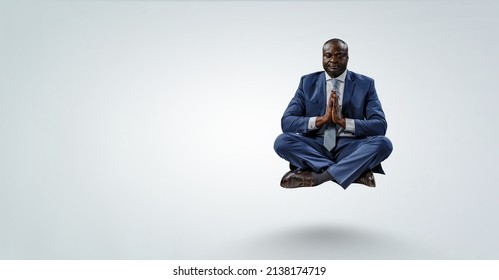 Young Black Man Sitting And Meditating . Mixed Media