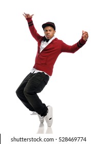 Young black man top dancing isolated on a white background