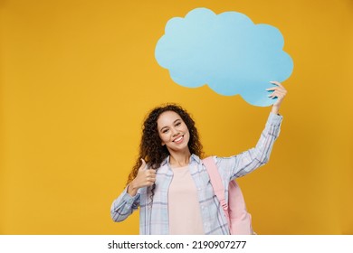 Young Black Teen Girl Student Wear Casual Clothes Backpack Bag Hold Empty Blank Say Cloud Speech Bubble Promotional Content Isolated On Plain Yellow Background. High School University College Concept