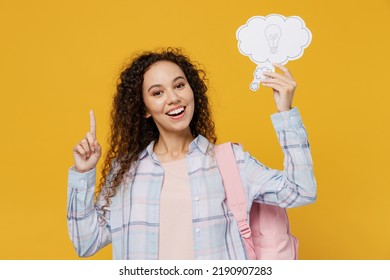 Young Black Teen Girl Student She Wear Casual Clothes Backpack Hold Empty Blank Say Cloud Speech Bubble Promotional Content Isolated On Plain Yellow Background. High School University College Concept