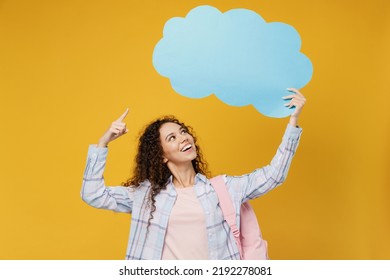 Young Black Teen Girl Student Wear Casual Clothes Backpack Bag Point Finger On Empty Blank Say Cloud Speech Bubble Content Isolated On Plain Yellow Background. High School University College Concept