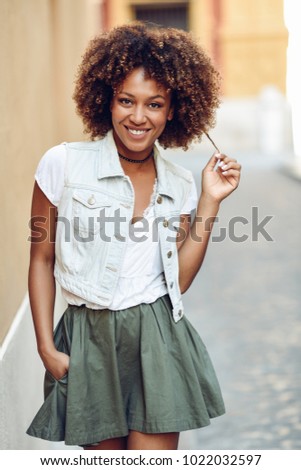 Similar – blYoung black woman, afro hairstyle, smiling outdoors