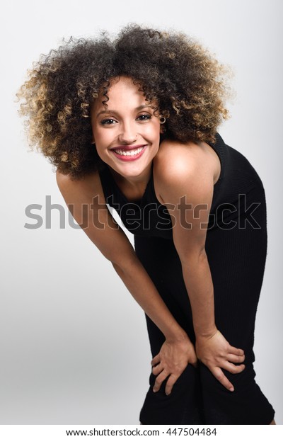 Young Black Woman Afro Hairstyle Smiling Royalty Free