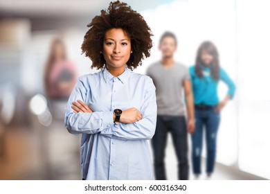 young black woman crossing arms - Shutterstock ID 600316340