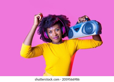 Young Black Woman Dancing Listening Music Wireless Headphnes Holding Boombox Isolated Background