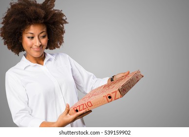 Young Black Woman Holding A Pizza Box