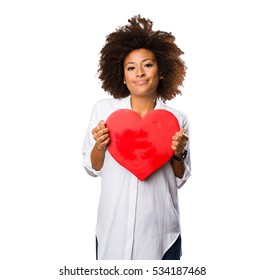 Young Black Woman Holding A Red Heart Shape