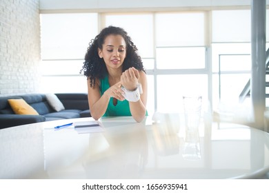 Young Black Woman Measuring Blood Pressure At Home