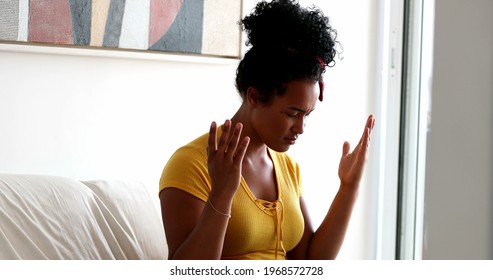 Young Black Woman Praying At Home, African Girl Having Faith