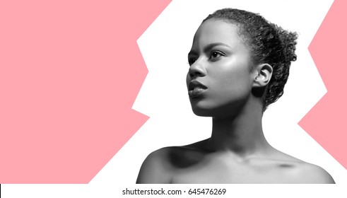 Young Black Woman In Profile With Bare Shoulders