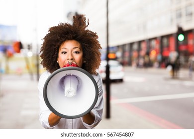 Young Black Woman Shouting On The Megaphone