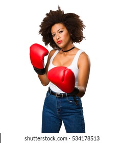 Young Black Woman Using Boxing Gloves