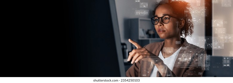 Young Black woman working in office and digital technology concept. Wide angle visual for banners or advertisements. - Powered by Shutterstock