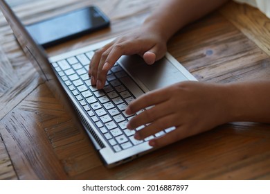 Young Black Woman Working On Laptop Keyboard For Send Emails And Surf On A Web Browser, Businesswoman Scrolling And Web Surfing Online At Work, Student Professional Study, Working From Home Or Office