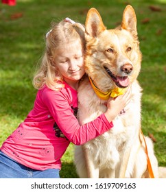 Young Blond Girl With Pet Dog At National Competition 