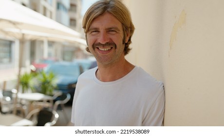 Young Blond Man Smiling Confident Standing At Street