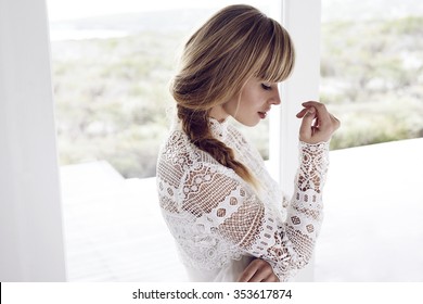 Young Blond Woman In Chic Boho Style Top