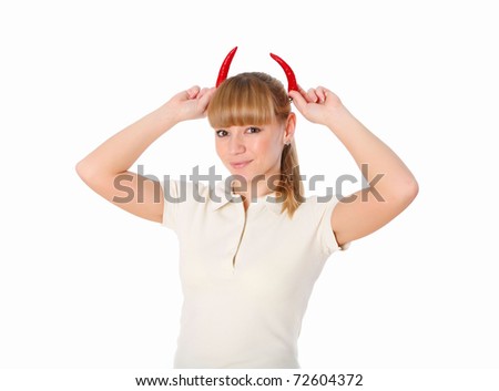 a young blond woman holding red peppers like horns