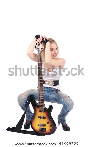 Young blond woman with rock guitar, isolated on the white background.