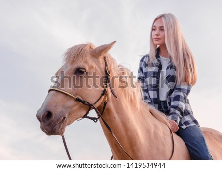 Similar – Image, Stock Photo Portrait of adult woman with beautiful horse in nature. Sunlight, silhouette.Concept of love for lesser brothers, caring and animal training